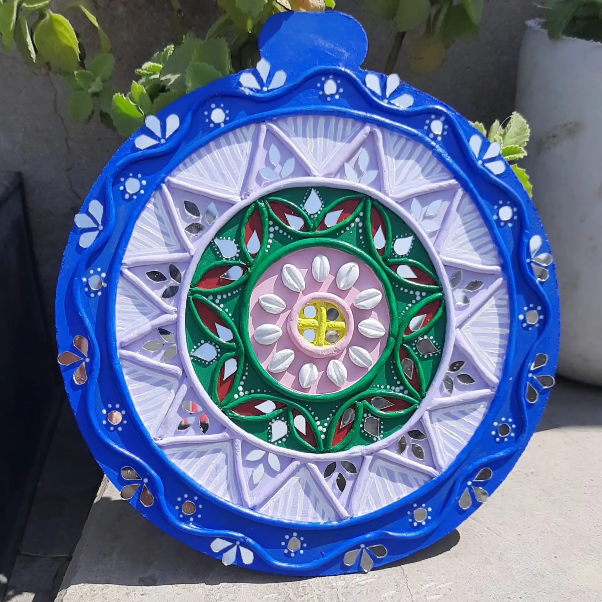 Blue and green floral Lippan mandala with mirrors